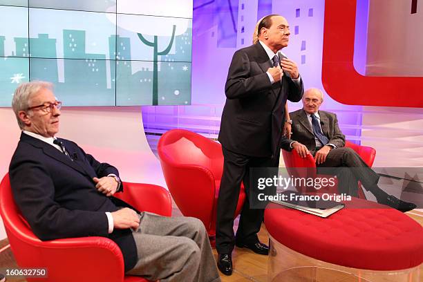 Former Italian Prime Minister Silvio Berlusconi , Vittorio Feltri and Giovanni Valentini attend 'L'Aria Che Tira' TV show on February 1, 2013 in...