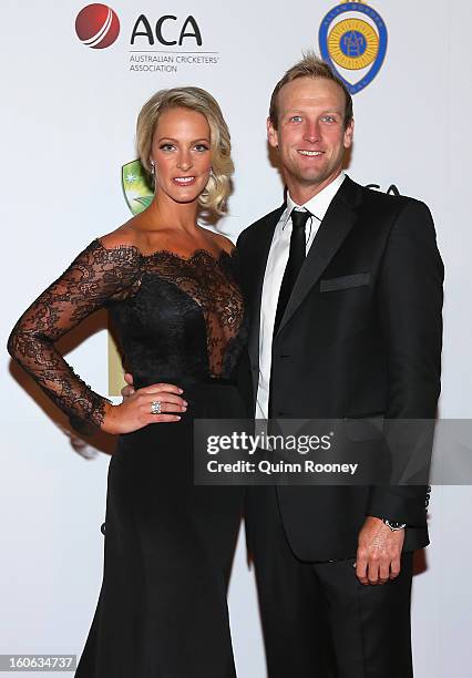 Cameron White of Australia and his partner Jacqui Morris arrive at the 2013 Allan Border Medal awards ceremony at Crown Palladium on February 4, 2013...