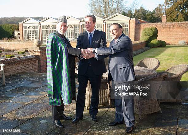 Prime Minister David Cameron hosts a trilateral meeting with President Hamid Karzai of Afghanistan and President Asif Ali Zardari of Pakistan at the...