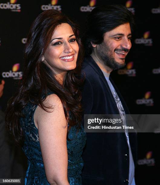 Indian actor Sonali Bendre with her husband Goldie Behl during 4th anniversary party of Colors at Grand Hyaat on February 2, 2013 in Mumbai, India.