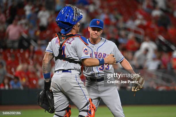 Francisco Alvarez and Trevor Gott of the New York Mets celebrate their team's 4-2 victory over the St. Louis Cardinals at Busch Stadium on August 17,...