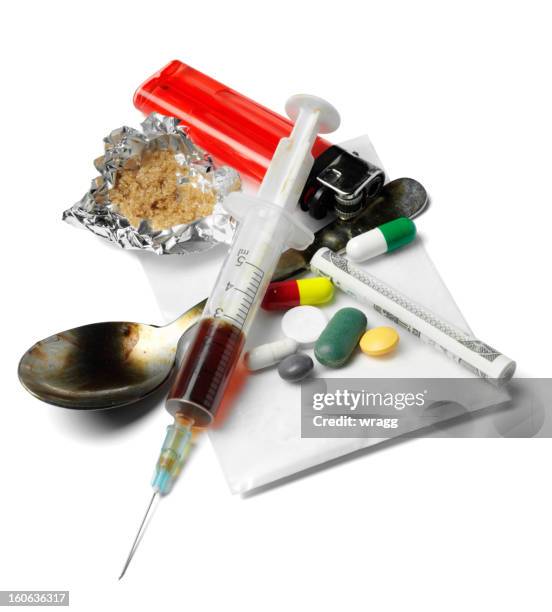 drugs and needle - heroïne stockfoto's en -beelden