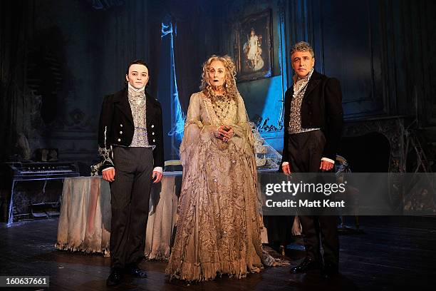 Taylor Jay-Davies as Young Pip, Paula Wilcox as Miss Havisham and Paul Nivison as Adult Pip pose during a photcall for 'Great Expectations' at...