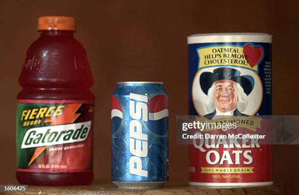 Can of Pepsi is shown in front of a box of Quaker Oats and a bottle of Gatorade August 2, 2001 in Boston MA. The Federal Trade Commission Wednesday...