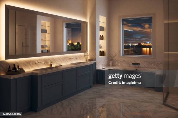 modern bathroom interior with hot tub at night - bathroom night stockfoto's en -beelden