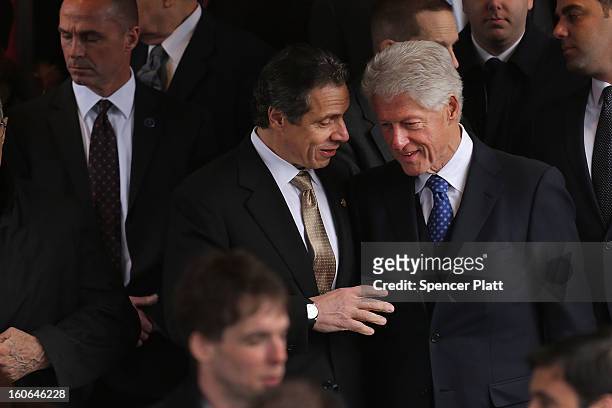 Former President Bill Clinton and New York Gov. Andrew Cuomo exit funeral services for former New York Mayor Ed Koch at Manhattan's Temple Emanu-El...