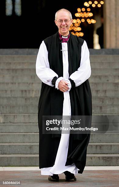 The Most Reverend Justin Welby, Archbishop of Canterbury stands on the steps of St Paul's Cathedral after attending a service confirming him as the...