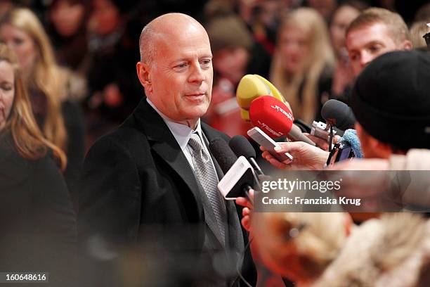 Bruce Willis attends the German premiere of 'Die Hard - Ein Guter Tag Zum Sterben' at the cinestar Potsdamer Platz on February 4, 2013 in Berlin,...