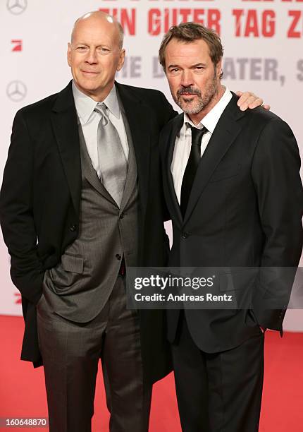 Bruce Willis and Sebastian Koch attend 'Die Hard - Ein Guter Tag Zum Sterben' Germany Premiere at Cinestar Potsdamer Platz on February 4, 2013 in...