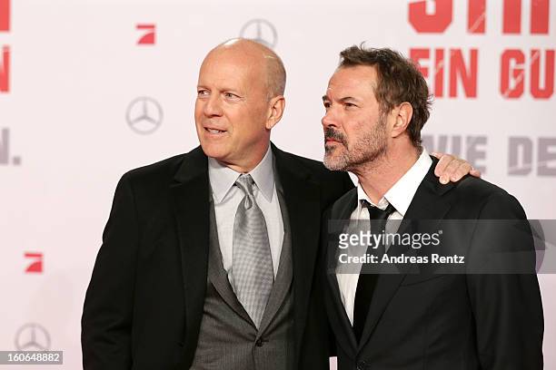 Bruce Willis and Sebastian Koch attend 'Die Hard - Ein Guter Tag Zum Sterben' Germany Premiere at Cinestar Potsdamer Platz on February 4, 2013 in...