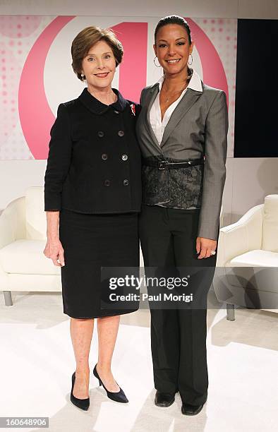 Former U.S. First lady Laura Bush poses for a photo with actress Eva LaRue at the 2013 Susan G. Komen Global Women's Cancer Summit at Fairmont Hotel...