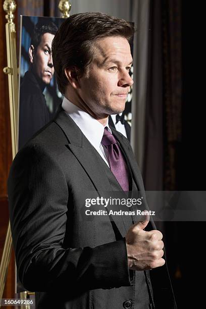 Mark Wahlberg attends a photocall for 'Broken City' at Hotel Ritz Carlton on February 4, 2013 in Berlin, Germany.