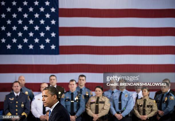 President Barack Obama speaks about gun violence at the Minneapolis Police Department's special operations center on February 4, 2013 in Minneapolis,...