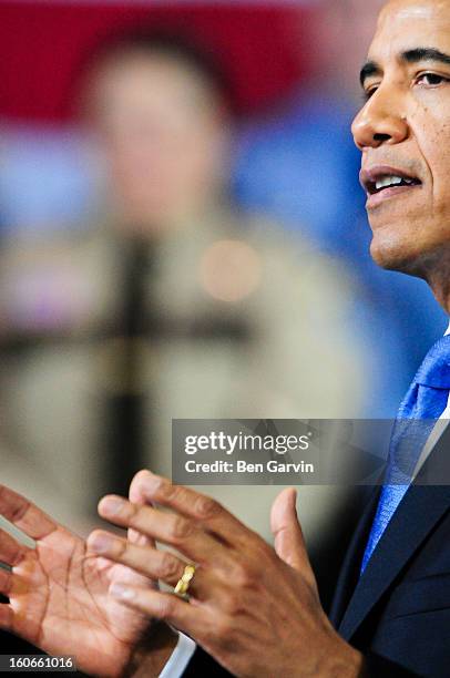 President Barack Obama speaks before a crowd of local leaders and law enforcement officials at the Minneapolis Police Department Special Operations...