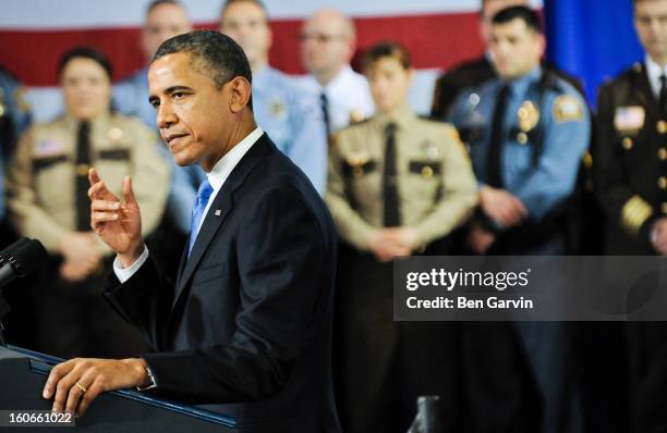 President Barack Obama speaks before a crowd of local leaders and law enforcement officials at the Minneapolis Police Department Special Operations...