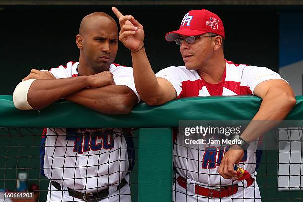 Luis Mateo and Pedro Lopez of Puerto Rico talk during the Caribbean Series 2013 at Sonora Stadium on February 03, 2013 in Hermosillo, Mexico.