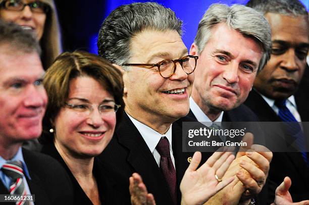 From left, St. Paul Mayor Chris Coleman, U.S. Sen. Amy Klobuchar , U.S. Sen. Al Franken , Minneapolis Mayor R.T. Rybak and U.S. Attorney for...