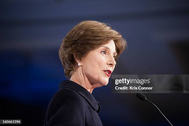 Former First Lady Laura Bush speaks during the 2013 Susan G. Komen Global Women's Cancer Summit on World Cancer day at the Fairmont Hotel on February...