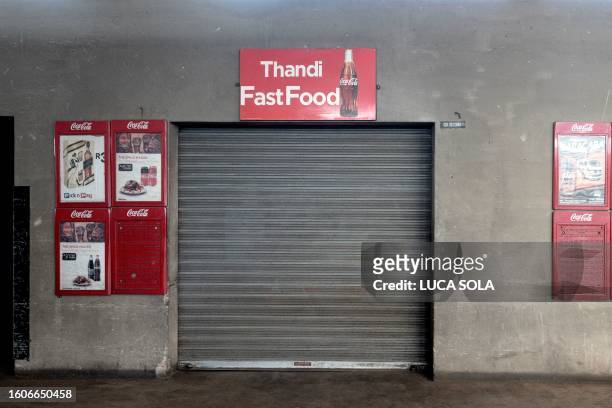 General view of a closed food joint at the Bara taxi rank market in Diepkloof, Soweto, on August 13, 2023.