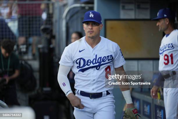 Los Angeles Dodgers shortstop Enrique Hernandez walks through the dugout before the game between the Milwaukee Brewers and the Los Angeles Dodgers on...