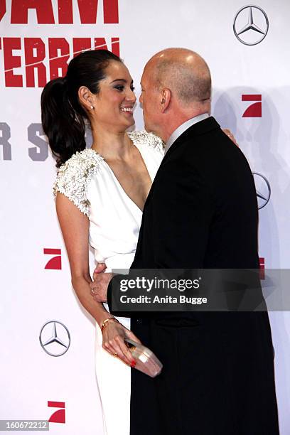 Actor Bruce Willis and his wife Emma Willis attend the 'Die Hard - Ein Guter Tag Zum Sterben' Germany premiere at CineStar Sony Center on February 4,...