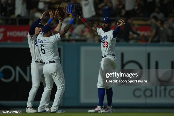 Los Angeles Dodgers right fielder Jason Heyward , Los Angeles Dodgers left fielder David Peralta , and Los Angeles Dodgers center fielder James...