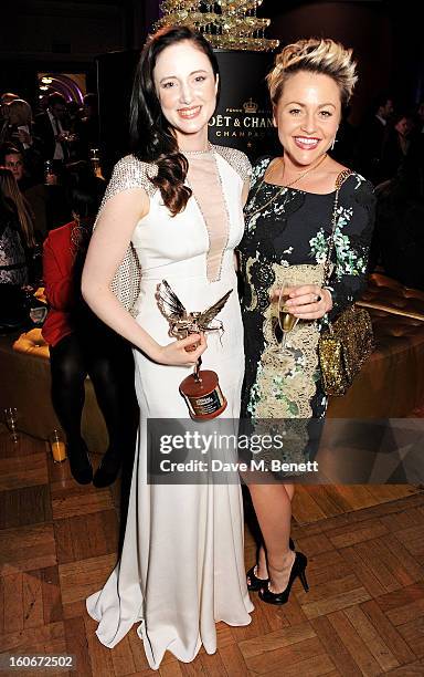 Best Actress winner Andrea Riseborough and Jaime Winstone attend the London Evening Standard British Film Awards supported by Moet & Chandon and...