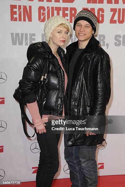Masha Tokareva and Vinzenz Kiefer attend the premiere of 'Die Hard - Ein Guter Tag Zum Sterben' at Sony Center on February 4, 2013 in Berlin, Germany.