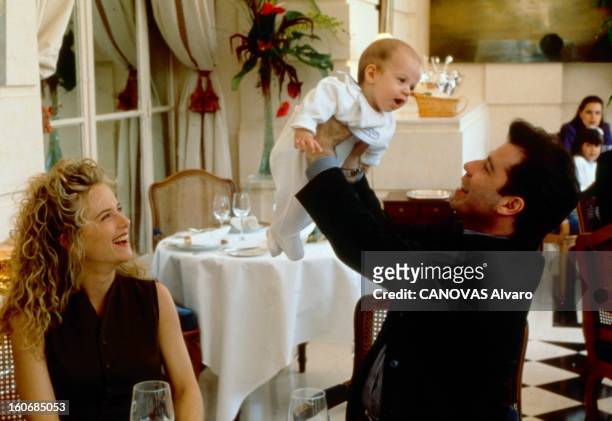 Rendezvous With John Travolta. John TRAVOLTA en famille au Trianon Palace de Versailles : l'acteur soulevant dans ses bras son fils Jett sous le...