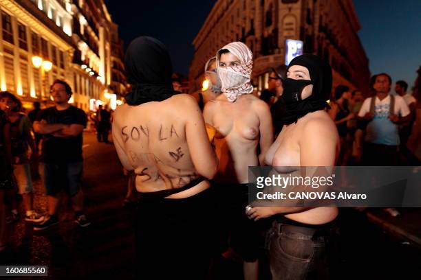 The Xxvith Youth World Day In Spain. JMJ à Madrid du 7 au 21 août 2011 --- Manifestation anti-JMJ. Ici, des femmes seins nus, le visage caché. Dans...