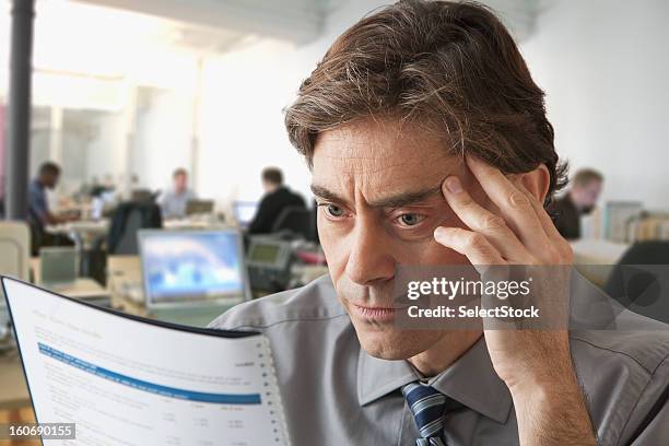 business man going over report - shirt and tie close up stock pictures, royalty-free photos & images