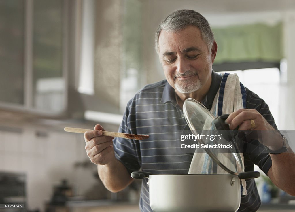 Elderly man cooking