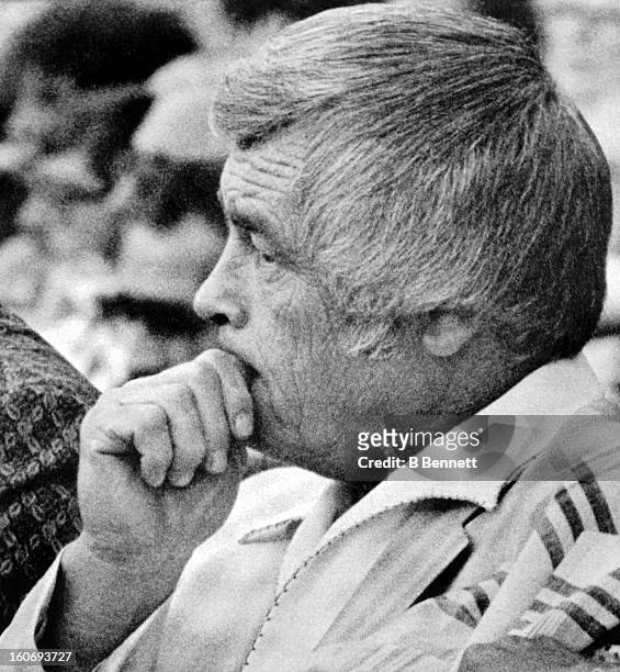 Manager Earl Weaver of the Baltimore Orioles serves the first game of a three game suspension as he looks on from the stands during an MLB game...