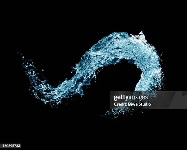 water splash in midair on black background - wave water stock pictures, royalty-free photos & images