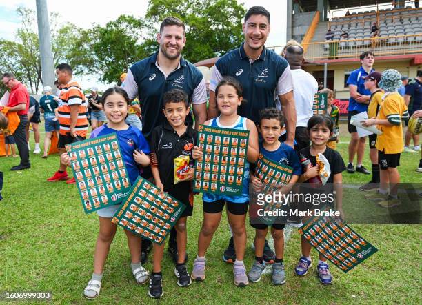 David Porecki and Izaia Perese of the Wallabies meet kids at the at Wallabies Community Event after the Australia Wallabies training session at the...