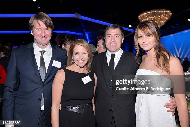 Director Tom Hooper, Katie Couric, Director David O. Russell and Actress Jennifer Lawrence attend the 85th Academy Awards Nominations Luncheon at The...