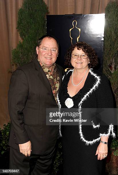 Director John Lasseter and wife Nancy Lasseter attend the 85th Academy Awards Nominations Luncheon at The Beverly Hilton Hotel on February 4, 2013 in...