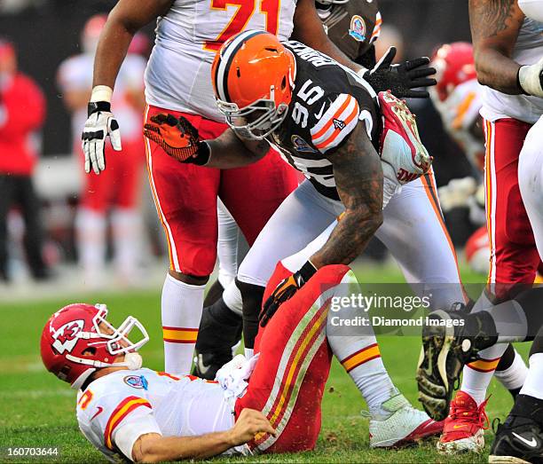 Linebacker Juqua Parker of the Cleveland Browns celebrates after getting a hit on quarterback Brady Quinn of the Kansas City Chiefs during a game...