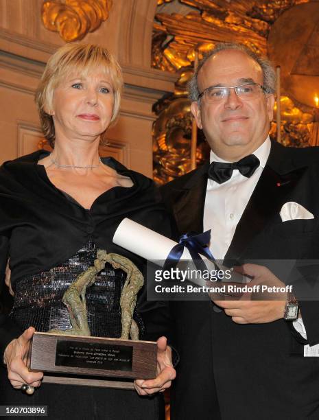 Professor David Khayat and Marie-Christiane Marek pose after Marek received the Prize of the Paris Charter against Cancer during the gala dinner of...