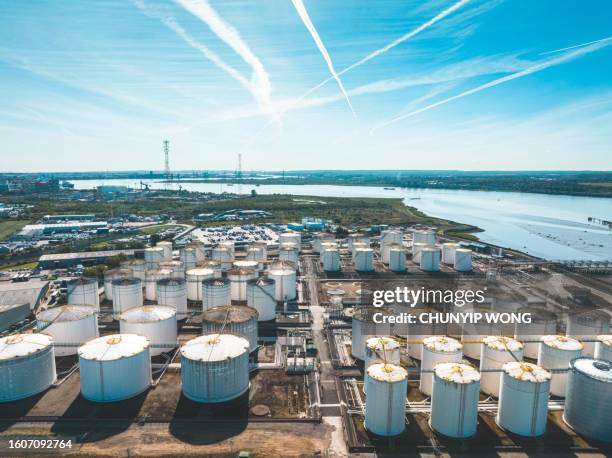 oil storage depot near thames river in england - station stock pictures, royalty-free photos & images