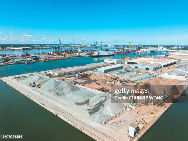 tilbury grain terminal river thames ships loading drone aerial view - cement factory stock pictures, royalty-free photos & images