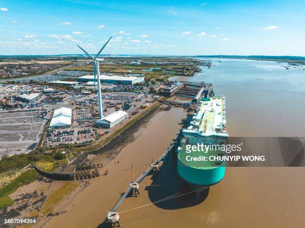 view of a big car carrier ship at tilbury docks, uk - wind generator stock pictures, royalty-free photos & images