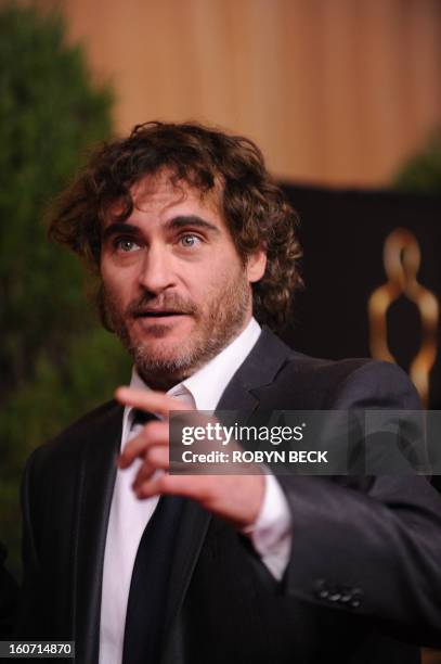 Actor Joaquin Phoenix arrives at the 85th Academy Awards Nominees Luncheon at The Beverly Hilton Hotel on February 4, 2013 in Beverly Hills,...