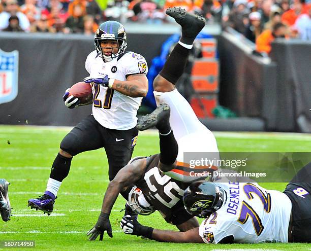 Running back Ray Rice of the Baltimore Ravens runs the football during a game against the Cleveland Browns at Cleveland Browns Stadium in Cleveland,...