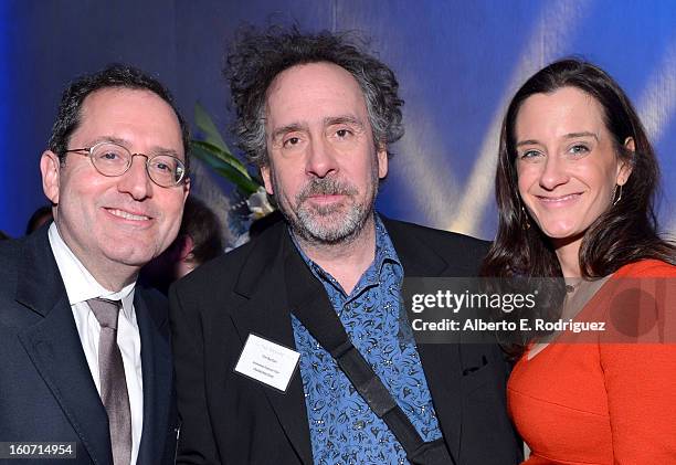 Co-president of Sony Pictures Classics Michael Barker, director Tim Burton, and guest attend the 85th Academy Awards Nominations Luncheon at The...