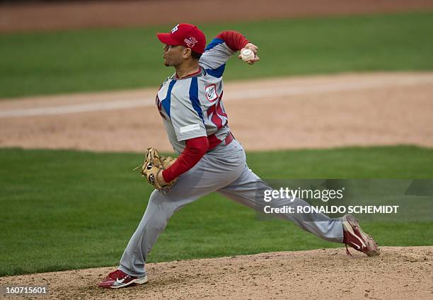 Pitcher Saul Rivera of Criollos de Caguas of Puerto Rico, pitches against Leones del Escogido of Dominican Republic, during the 2013 Caribbean...