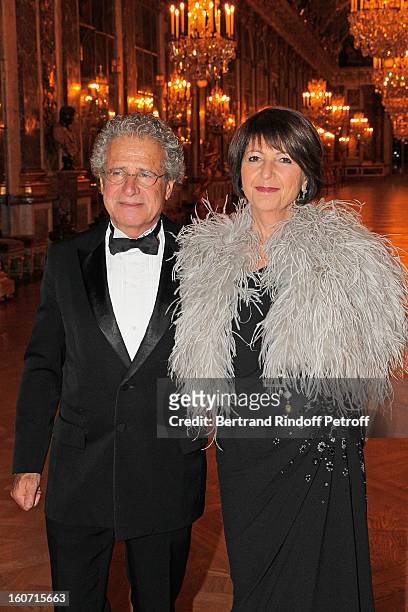 Laurent Dassault and his wife Martine pose in the Hall of Mirrors as they attend the gala dinner of Professor David Khayat's association 'AVEC', at...