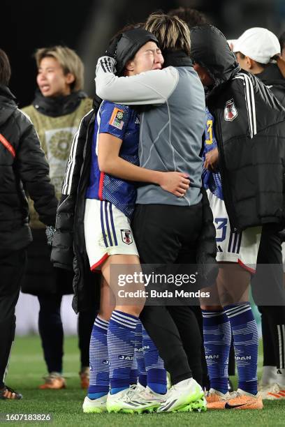 Jun Endo of Japan is consoled by her teammate Chika Hirao after the team's 1-2 defeat and elimination from the tournament following the FIFA Women's...