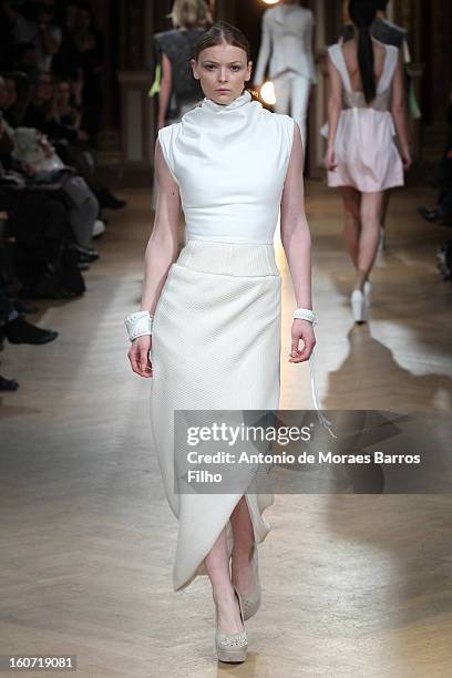 Model walks the runway during New Stylists Podium 4th Edition Fashion Show at Hotel Westin on February 4, 2013 in Paris, France.