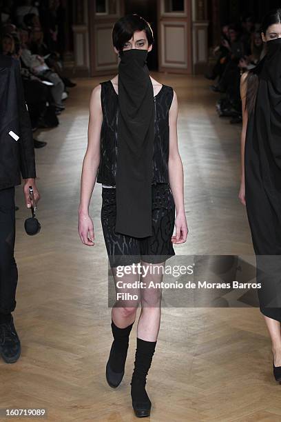 Model walks the runway during New Stylists Podium 4th Edition Fashion Show at Hotel Westin on February 4, 2013 in Paris, France.